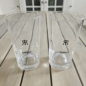VINTAGE clear, cylindrical glasses with the "Ronrico" logo printed on them.